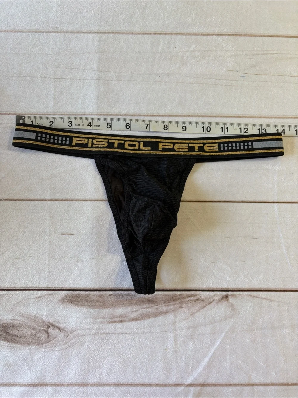 Pistol Pete Men's Black Mesh Thong with Gold Waistband